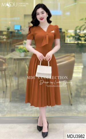 Váy Thiết Kế MDU3982 Tông Cam Đất ,Điểm Nhấn Cắt Xếp Ngực Cổ Tỉnh Tế Và Quyến Rũ