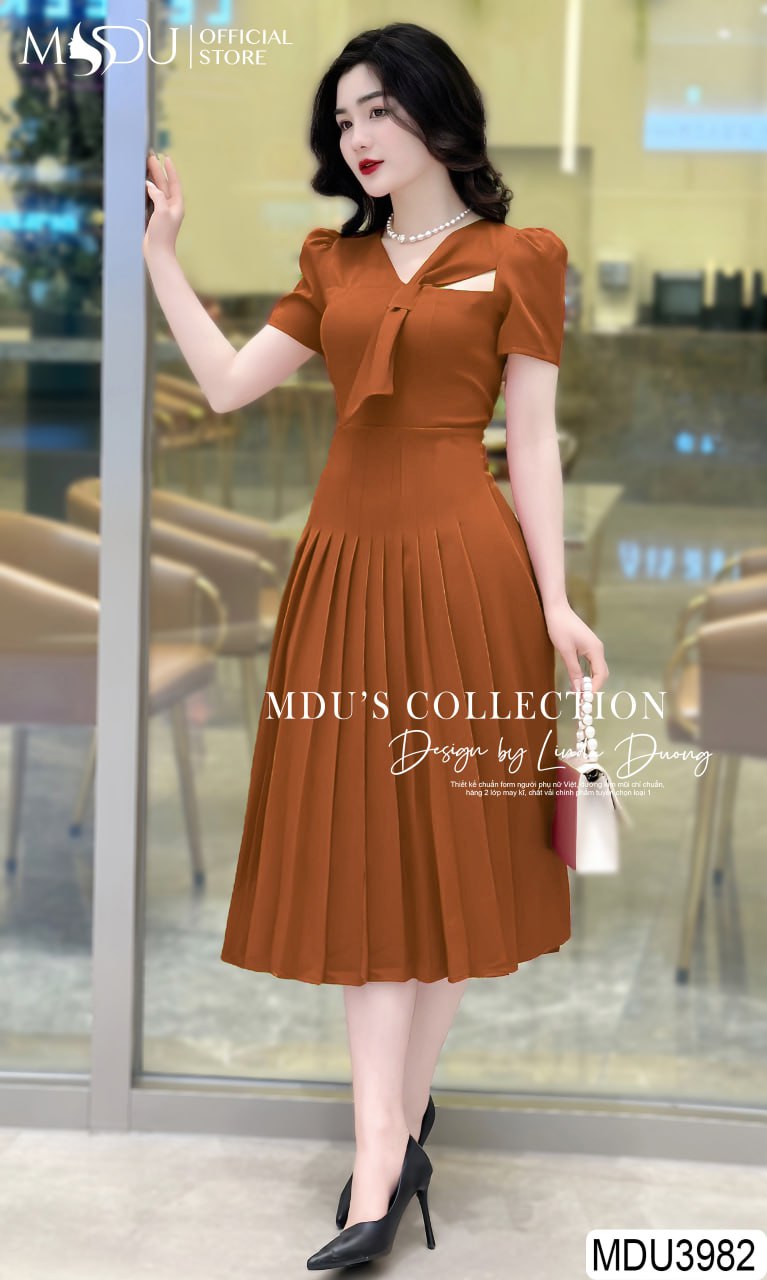 Đầm dự tiệc màu cam dáng xếp ly