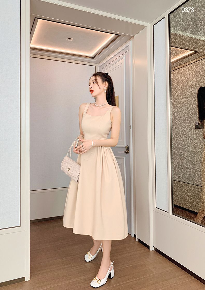 Đầm 2 Dây Đính Nơ Cuốn Hút – Sự Lựa Chọn Táo Bạo Cho Các Buổi Tiệc Tối