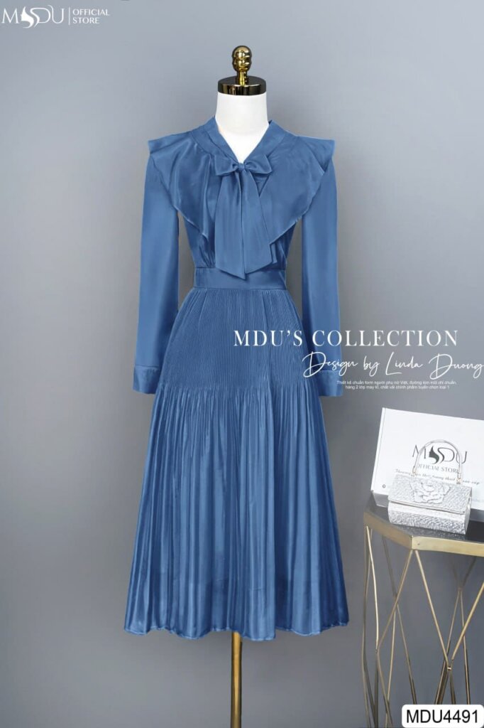 Chất Liệu – “Linh Hồn” Của Chiếc Váy Dự Tiệc Màu Xanh