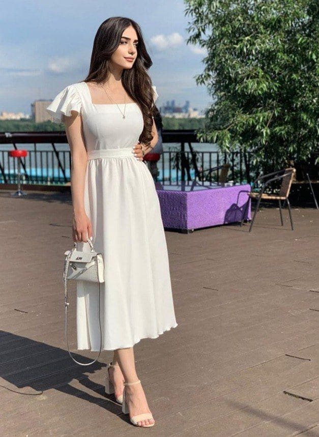 Vì Sao Váy Trắng Đi Biển Là Lựa Chọn Hoàn Hảo Cho Người Béo?