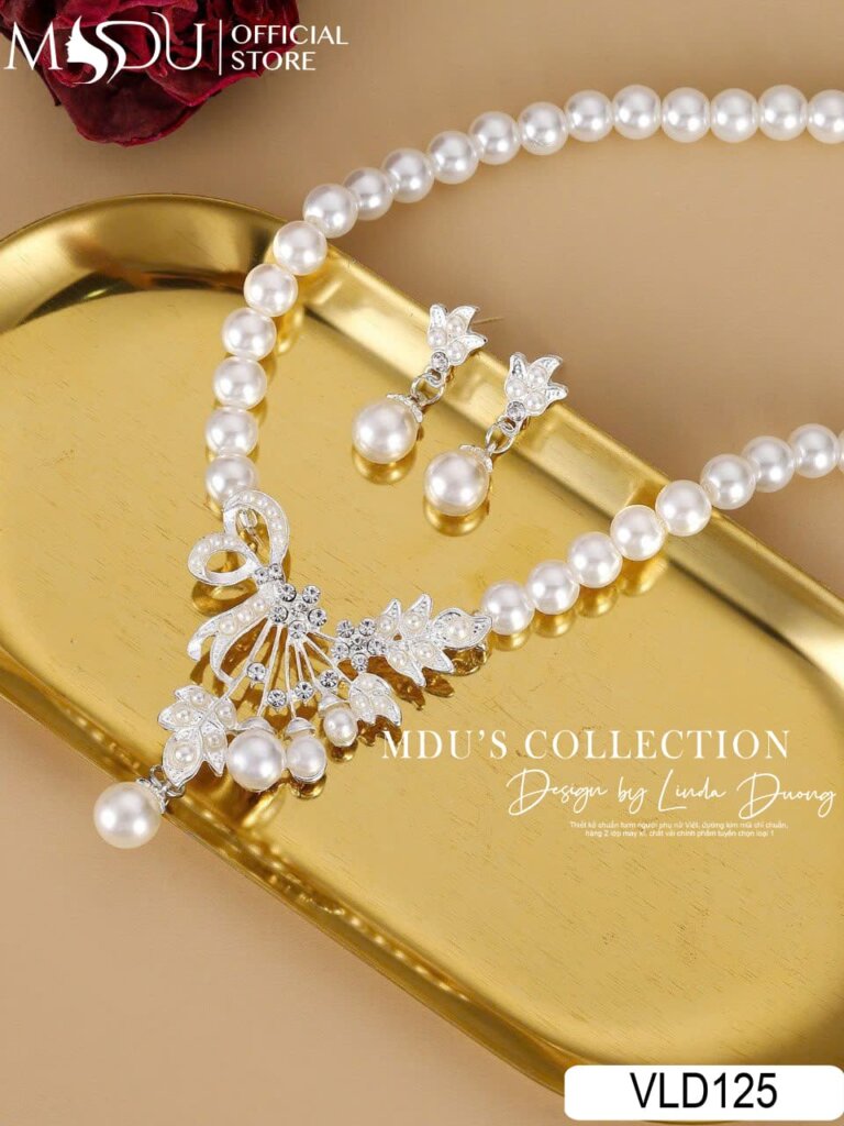 VLD125 – Bộ Trang Sức Ngọc Trai Phối Pha Lê Với Chiếc Nơ Duyên Dáng